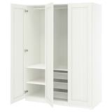 An open white ikea PAX wardrobe. It adjustable shelves, mesh basket, and soft-close hinges.