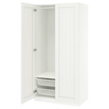 Open white PAX wardrobe with mesh baskets.