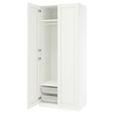 An open white ikea PAX wardrobe with shelves and mesh baskets.