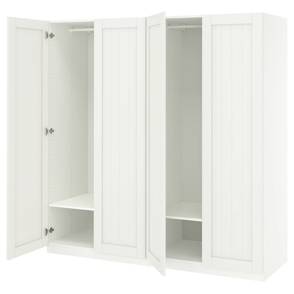 This image shows two white ikea PAX wardrobes with open doors, featuring ample storage space and adjustable hinges.