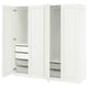 A white ikea PAX wardrobe with open doors revealing shelves and mesh drawers.