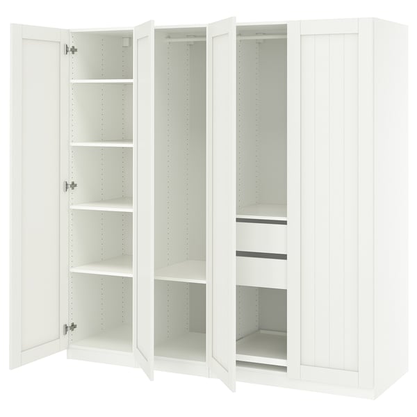 White PAX wardrobe with multiple open shelves and compartments.