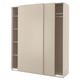 A beige PAX wardrobe with sliding doors and interior shelves.