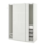 A white ikea PAX wardrobe with sliding doors and mesh baskets.