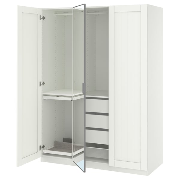 White PAX wardrobe with mirror doors, shelves, and drawers for storage.