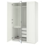 PAX white wardrobe with mirrored doors, adjustable shelves, and mesh basket.