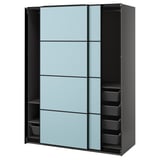 A light blue ikea PAX wardrobe with sliding doors and mesh drawers.