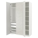 A white PAX wardrobe with open doors revealing shelves and drawers, decorated with a wavy pattern.