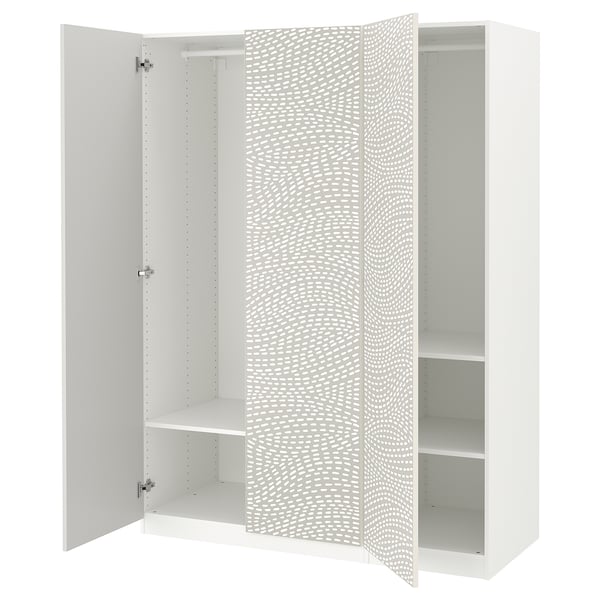 A white ikea PAX wardrobe with open doors, featuring a dotted pattern.