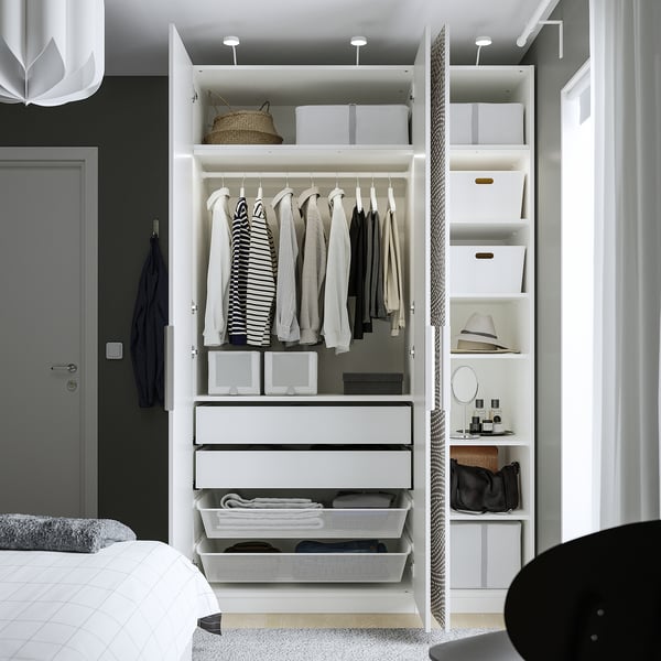 Modern wardrobe: adjustable, with mesh baskets, drawers, and hanging space for clothes.