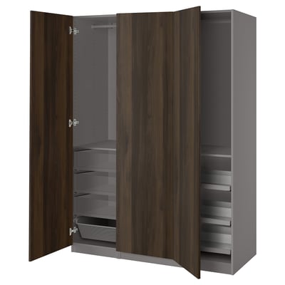 Dark wood PAX wardrobe with open drawers and shelves, various compartments.