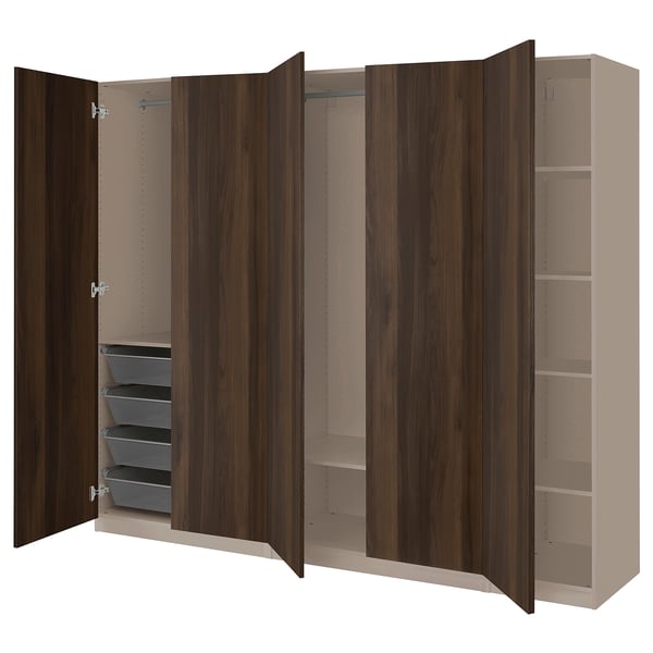 An open, dark wood-colored PAX wardrobe with shelves and drawers.