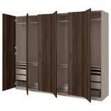 An open brown wood-like PAX wardrobe with shelves and drawers.