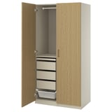 This image shows an ikea PAX wardrobe in beige with oak veneer, featuring a hanging rod and pull-out drawers.