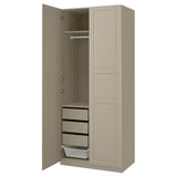A beige PAX wardrobe with open doors, featuring drawers and a hanging rail inside.