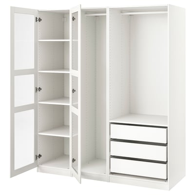 White PAX wardrobe with open doors, shelves, drawers, and metal hinges.