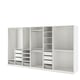 White ikea PAX wardrobe with shelves, rails, glass drawers. Storage solution for clothes and accessories.