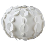 White PEKTOLIT lamp, sea urchin-shaped shade, flat-pack design, diffused light.