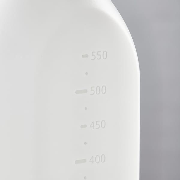 White spray bottle displaying measurement levels from 400 to 550 ml on curved side, set against a gradient gray background.