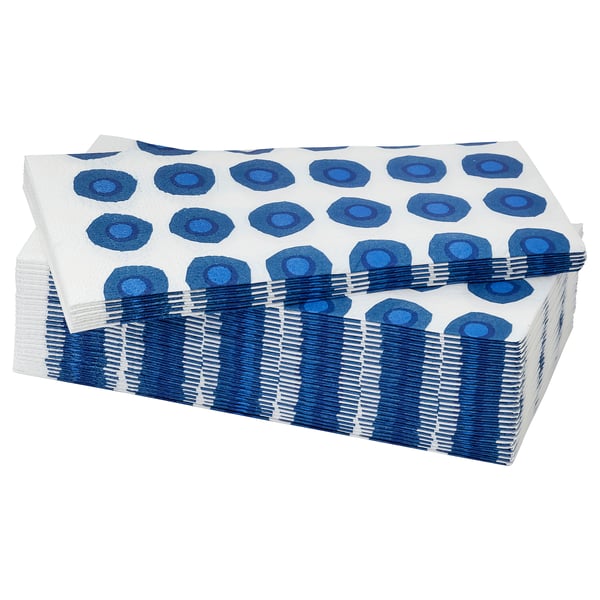 Stacked blue and white patterned napkins, shaped into triangles, made of paper.