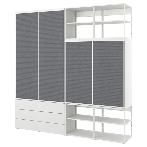 White PLATSA modular storage with grey fabric panels, customizable shelves, and sliding doors for efficient space use.