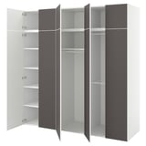 Modern storage unit with adjustable dark gray and white sections, open shelves, and hanging rods for versatile organization.