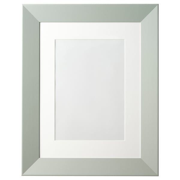 Green PLOMMONTRÄD picture frame: wide, robust design with front plastic protection, fiberboard material, stands or hangs vertically/horizontally.