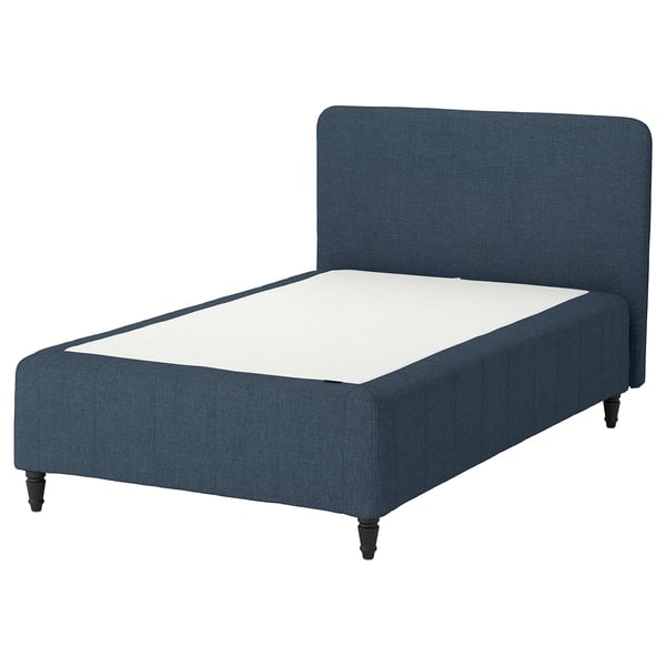 RÅHOLMAR bed in blue fabric with white mattress; modern design, upholstered headboard, four wooden legs.