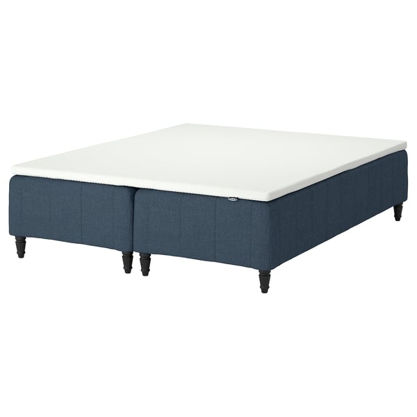 RÅHOLMAR bed: blue, cloth base, white mattress, wooden legs.