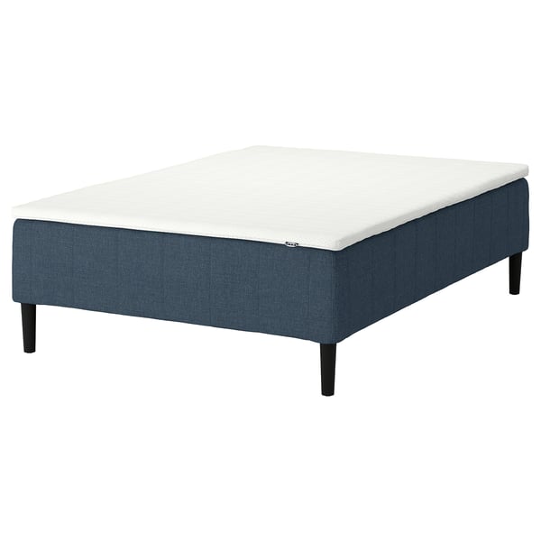 IKEA RÅHOLMAR bed, blue base, white mattress.