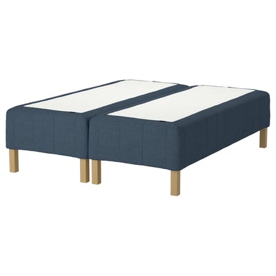 The RÅHOLMAR blue bed base with wooden legs, featuring a sleek, modern design.