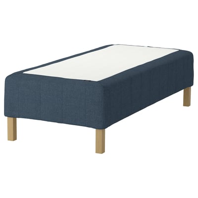 A blue fabric upholstered sleigh-style bed frame with wooden legs.
