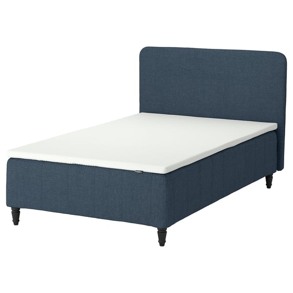 IKEA RÅHOLMAR blue bed with memory foam mattress, rectangular, upholstered headboard.