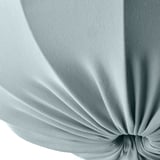 Gray fabric lampshade close-up, showing smooth, knotted texture.