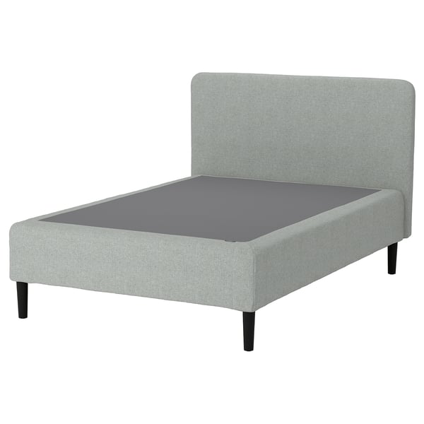 A grey RENFJÄLLET bed with a plush headboard, supported by dark wooden legs.