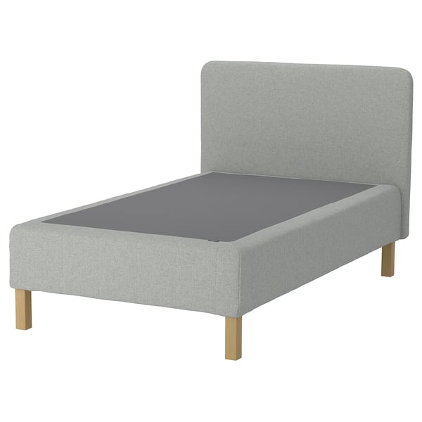 A RENFJÄLLET grey fabric bed with a padded headboard and wooden legs.