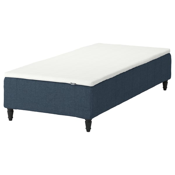 A RENFJÄLLET bed with a white mattress on a blue base and wooden legs.