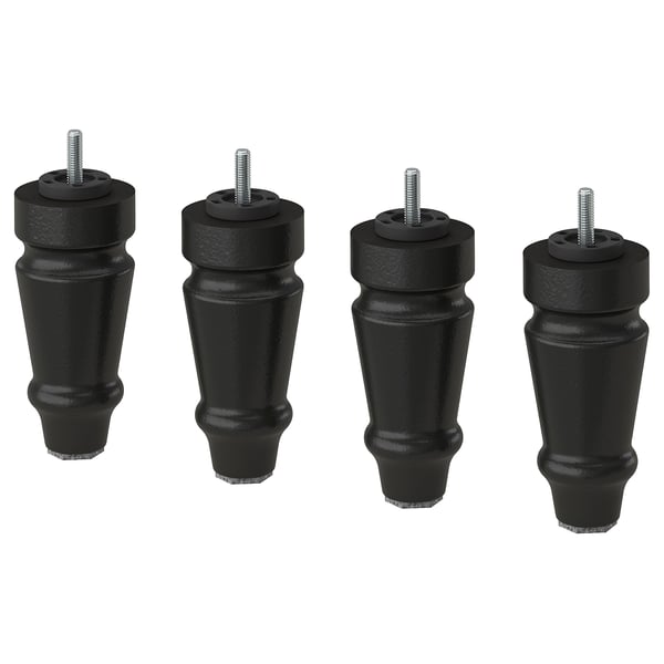 Four black, cylindrical wooden furniture legs with metal screws on top, evenly spaced.