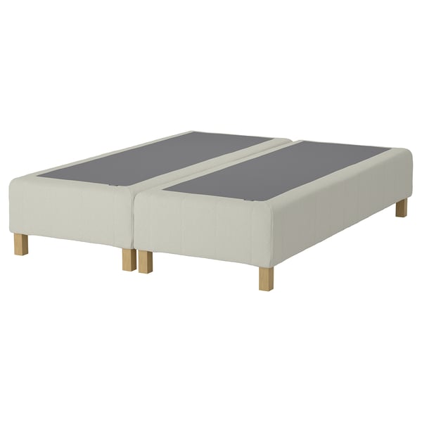 RENFJÄLLET bed base: white, upholstered with wooden legs, divided mattress surface.