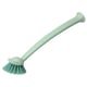 A green RINNIG kitchen brush with a long handle and a suction cup at the end, designed to attach to surfaces for convenience.