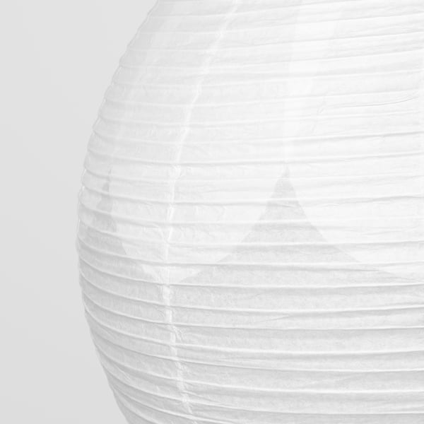 Close-up of stylish rice paper lamp, showing its natural texture and layered design.