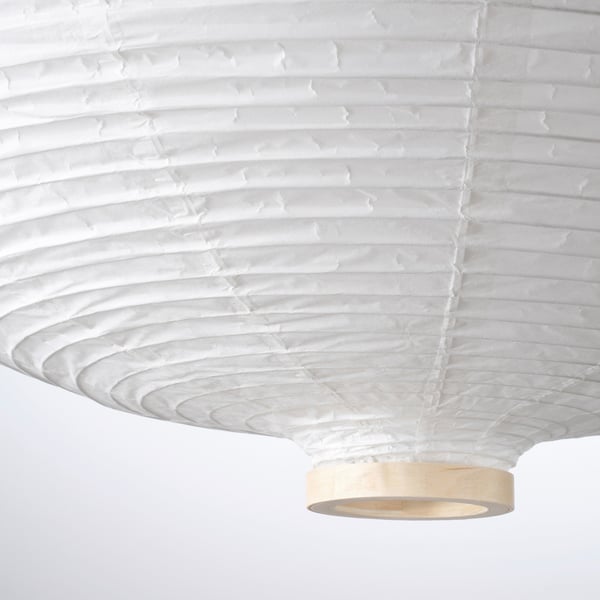 A spacious, elegant lamp with double-layered rice paper, emitting soft, even light; birch veneer base.