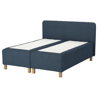 RISHÖJDEN bed, blue, upholstered, rectangular, with wooden legs and headboard.