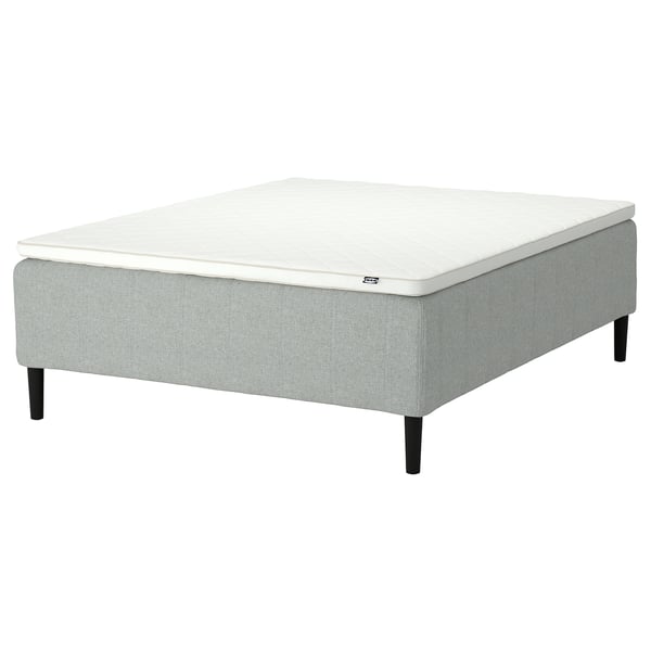 RISHÖJDEN mattress, light grey, square, firm, with white top, supported by black legs.