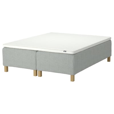 RISHÖJDEN mattress base and pad in light grey fabric, featuring 7 comfort zones, wooden legs, and reinforced edges.