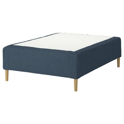 The RISHÖJDEN bed base in deep blue a wooden frame and four light wood legs, offering a modern and sturdy design.