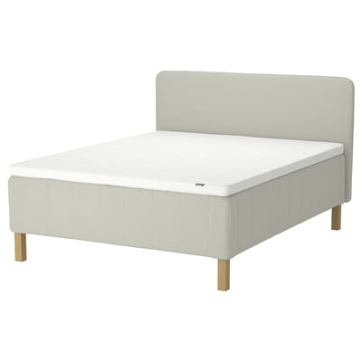 RISHÖJDEN bed: cream, upholstered with wooden legs, rectangular headboard, plush mattress with 7 comfort zones.