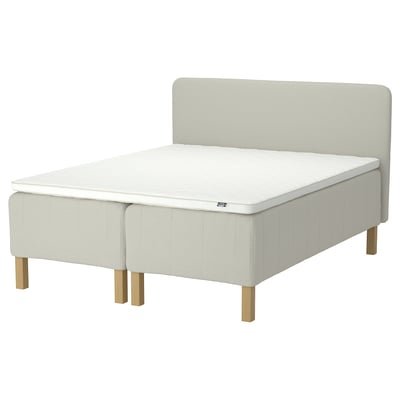IKEA RISHÖJDEN bed in beige, fabric with wooden legs, upholstered headboard, pocket spring mattress.