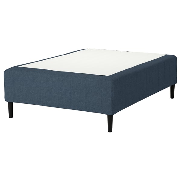 The RISHÖJDEN bed base in blue fabric with wooden legs, designed for mattress support and easy assembly.