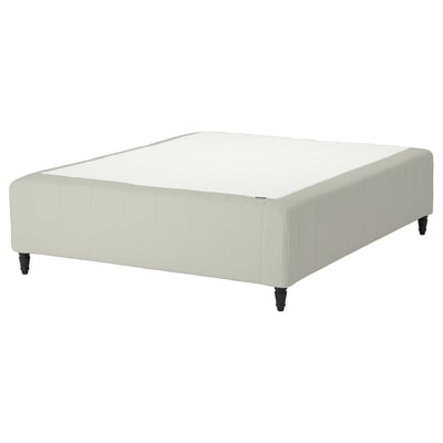 RISHÖJDEN mattress base: light beige, upholstered with recycled polyester, rectangular, raised on black conical legs.